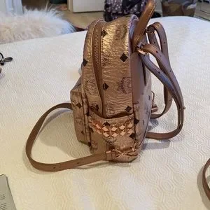 MCM Rose gold metallic mini backpack with studs on the sides MCM | Bags | Mcm Rose Gold Metallic Mini Backpack With Studs  main image 2